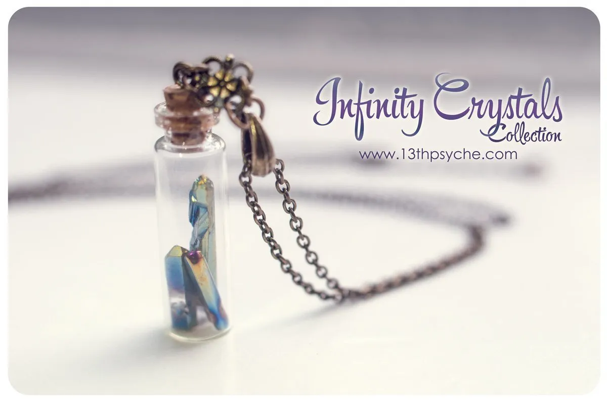 Glass vial pendant necklace with pointed crystal